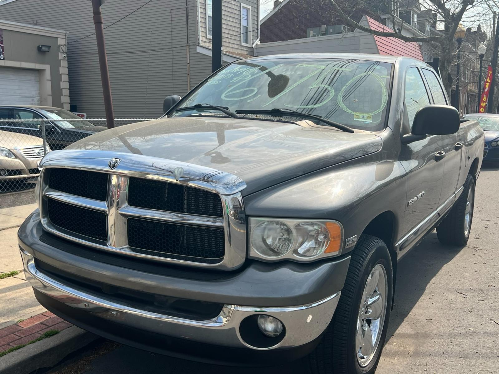2005 GRAY /BLACK CLOTH Dodge Ram 1500 Laramie Quad Cab Long Bed 4WD (1D7HU18D35S) with an 5.7L V8 OHV 16V engine, 5-Speed Automatic Overdrive transmission, located at 1018 Brunswick Ave, Trenton, NJ, 08638, (609) 989-0900, 40.240086, -74.748085 - Here is an awesome running work truck! Great shape and plenty of service history! Crew Cab w Hemi V-8 motor!! A must see and drive ASAP, call Anthony 609-273-5100 - Photo #0